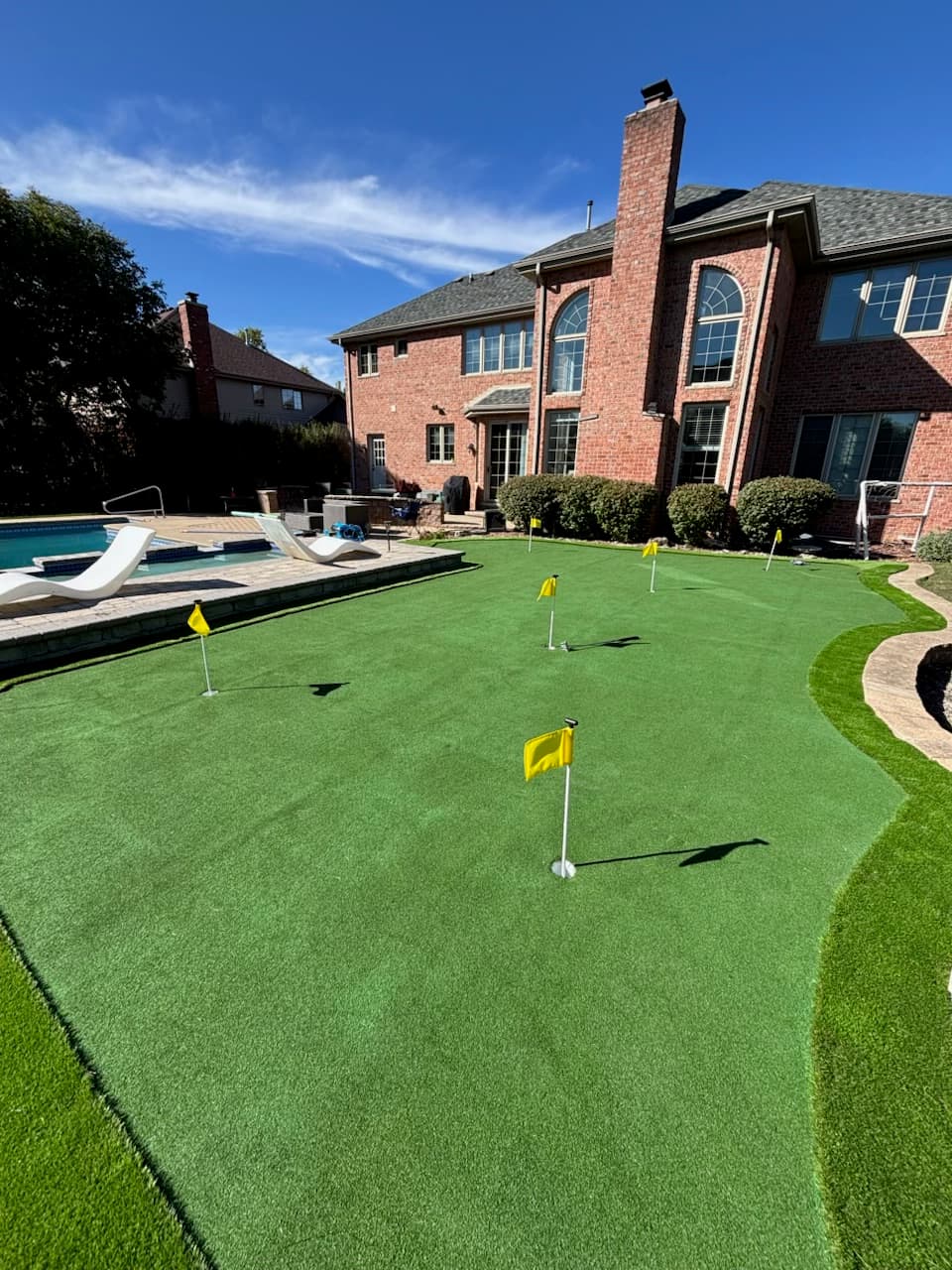 Backyard putting green installation